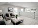 Cozy bonus room with neutral colors, carpet floors, and comfortable seating arrangements at 1308 Piper Glen Dr, Sunset Beach, NC 28468