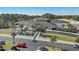 An elegant Sea Trail golf resort clubhouse with palm trees, manicured lawns, and an inviting entrance at 1308 Piper Glen Dr, Sunset Beach, NC 28468