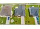 Aerial view of a home with a landscaped yard, driveway, and neighboring houses at 131 Crabapple Dr., Longs, SC 29568