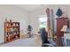 Bright bedroom with a window and some home gym equipment; perfect for a compact workout space at 131 Crabapple Dr., Longs, SC 29568