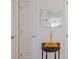 Charming hallway showcasing a decorative table and mirror, adding elegance to the interior at 131 Crabapple Dr., Longs, SC 29568
