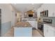 Modern kitchen with granite countertops, stainless steel appliances, and a center island with a sink at 131 Crabapple Dr., Longs, SC 29568
