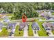 Aerial view of home, showcasing the property's well-maintained lawn and pond access at 135 Maggie Way, Myrtle Beach, SC 29588