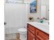 Bathroom featuring a white vanity, wood cabinets, and a shower with white curtain at 135 Maggie Way, Myrtle Beach, SC 29588