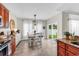 Open kitchen and dining area featuring a view of the backyard through sliding glass doors at 135 Maggie Way, Myrtle Beach, SC 29588