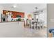 Charming dining area with natural light, stylish chandelier, and open connection to the kitchen at 135 Maggie Way, Myrtle Beach, SC 29588