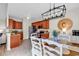 Bright kitchen/dining area featuring warm wood cabinets and stainless steel appliances at 135 Maggie Way, Myrtle Beach, SC 29588