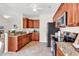 Well-equipped kitchen featuring granite countertops, tile flooring, and stainless steel appliances at 135 Maggie Way, Myrtle Beach, SC 29588