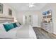 Bright main bedroom with a tray ceiling, neutral walls, and a mounted TV at 135 Maggie Way, Myrtle Beach, SC 29588