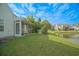 Exterior view of home highlighting screened in porch and lake view at 153 Wimbledon Way # 153, Murrells Inlet, SC 29576