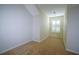 Cozy bedroom features neutral carpet, light walls, and plantation shutters for a bright and inviting space at 153 Wimbledon Way # 153, Murrells Inlet, SC 29576