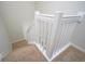 Carpeted staircase with white banister railing leading to the upper level at 153 Wimbledon Way # 153, Murrells Inlet, SC 29576