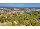 Scenic aerial shot of a golf course community surrounded by water, lush trees, and beautiful residential complexes at 1550 Spinnaker Dr. # 3123, North Myrtle Beach, SC 29582