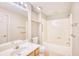 Bathroom featuring a single sink vanity, toilet, and a shower-tub combo at 1550 Spinnaker Dr. # 3123, North Myrtle Beach, SC 29582