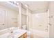 Bright bathroom with a vanity sink, toilet, bathtub, and a shower at 1550 Spinnaker Dr. # 3123, North Myrtle Beach, SC 29582