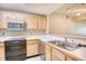 Kitchen featuring stainless steel appliances, light wood cabinets and white countertops at 1550 Spinnaker Dr. # 3123, North Myrtle Beach, SC 29582