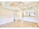 Open living room featuring neutral paint, wood flooring, and a view to the kitchen at 1550 Spinnaker Dr. # 3123, North Myrtle Beach, SC 29582