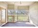 Enclosed porch offering relaxing views of a golf course at 1550 Spinnaker Dr. # 3123, North Myrtle Beach, SC 29582
