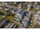 Aerial view of a bright two-story home featuring a private pool and fenced-in yard at 1613 Havens Dr., North Myrtle Beach, SC 29582