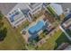 Stunning aerial view of the private backyard pool and multilevel deck at 1613 Havens Dr., North Myrtle Beach, SC 29582