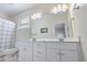 Bright bathroom with double sinks, neutral tiling, and shower/tub combo at 1613 Havens Dr., North Myrtle Beach, SC 29582