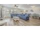 Spacious living room with comfortable seating, ceiling fan and plenty of light at 1613 Havens Dr., North Myrtle Beach, SC 29582