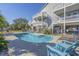 Inviting pool with lounge chairs and outdoor seating, perfect for relaxing in the sun at 1613 Havens Dr., North Myrtle Beach, SC 29582