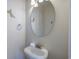 Cozy powder room featuring a classic pedestal sink and decorative wall accents at 1613 Havens Dr., North Myrtle Beach, SC 29582