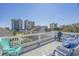 Spacious rooftop deck with chairs offering stunning city views and a place to relax at 1613 Havens Dr., North Myrtle Beach, SC 29582