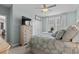 Bedroom with a full bed, ceiling fan, dresser, and natural light from the window at 1617 N Dogwood Dr. N, Surfside Beach, SC 29575