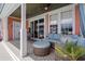 Comfortable outdoor patio with seating, a table, and view of the backyard at 1617 N Dogwood Dr. N, Surfside Beach, SC 29575