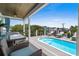 Outdoor space featuring a pool, covered seating area and tables for entertaining at 1617 N Dogwood Dr. N, Surfside Beach, SC 29575