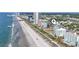Aerial view of the beach, hotels, pier 14, and the Sky Wheel at 1708 N Ocean Blvd. # 101, Myrtle Beach, SC 29577