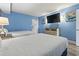 Bright bedroom featuring two beds, light blue walls and laminate flooring at 1708 N Ocean Blvd. # 101, Myrtle Beach, SC 29577