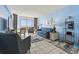 Open living room with ocean views, cozy seating, and a dining area at 1708 N Ocean Blvd. # 101, Myrtle Beach, SC 29577