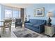 Cozy living room with ocean view, comfortable seating, and a dining area at 1708 N Ocean Blvd. # 101, Myrtle Beach, SC 29577