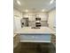 Spacious kitchen featuring granite countertops, stainless steel appliances, and ample cabinet space at 1709 Perthshire Loop, Myrtle Beach, SC 29579