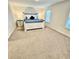 Main bedroom boasts a stylish bed, carpeted floors, and great natural light from the windows at 1709 Perthshire Loop, Myrtle Beach, SC 29579