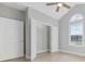Bedroom featuring vaulted ceilings, ceiling fan and large window overlooking the front yard allowing for natural light at 1727 Cane Branch Rd., Loris, SC 29569