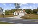 Inviting single-Gathering home featuring a well-manicured lawn and an attached garage at 1727 Cane Branch Rd., Loris, SC 29569