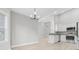 Open kitchen with stainless steel appliances and granite countertops at 1727 Cane Branch Rd., Loris, SC 29569