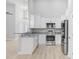Modern kitchen features stainless steel appliances and granite countertops at 1727 Cane Branch Rd., Loris, SC 29569