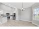 Open concept kitchen features granite countertops and stainless steel appliances at 1727 Cane Branch Rd., Loris, SC 29569