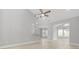 Spacious living room with modern lighting and bar seating into the kitchen at 1727 Cane Branch Rd., Loris, SC 29569