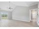 Bright bedroom with vaulted ceilings, light wood floors, and sliding glass doors, offering a serene retreat at 1900 Blue Bird Rd., Loris, SC 29569