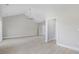 Open living room with high ceilings and vinyl flooring at 1900 Blue Bird Rd., Loris, SC 29569