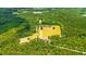Expansive acreage with lush woodlands, pasture, a serene pond, and a private residence at 1961 Bright Rd., Little River, SC 29566