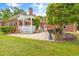 Brick house features a beautiful patio with pergola, ideal for outdoor relaxation and entertainment at 1961 Bright Rd., Little River, SC 29566