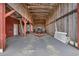 Spacious barn interior with a tractor, offering ample storage space and functionality on the property at 1961 Bright Rd., Little River, SC 29566