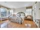 Spacious bedroom features hardwood floors, natural light, and a decorative bed frame at 1961 Bright Rd., Little River, SC 29566